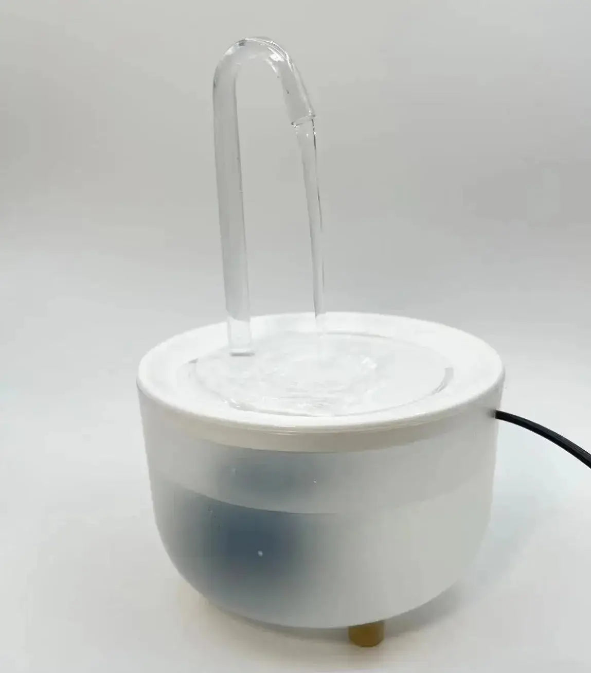 Cat Water Fountain with flowing water and modern design for pet hydration.