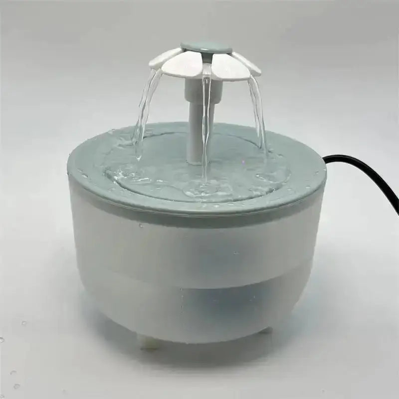 Cat Water Fountain with flowing water, providing fresh hydration for pets.
