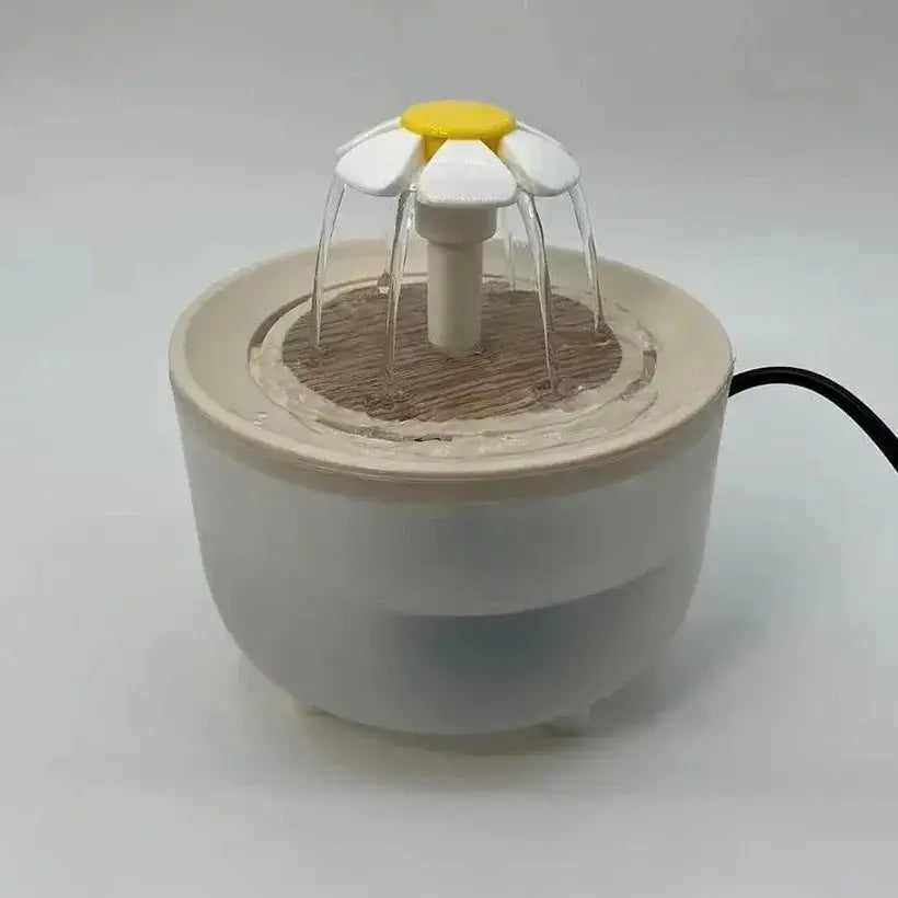 Cat Water Fountain with flowing water and flower design for healthy pet hydration